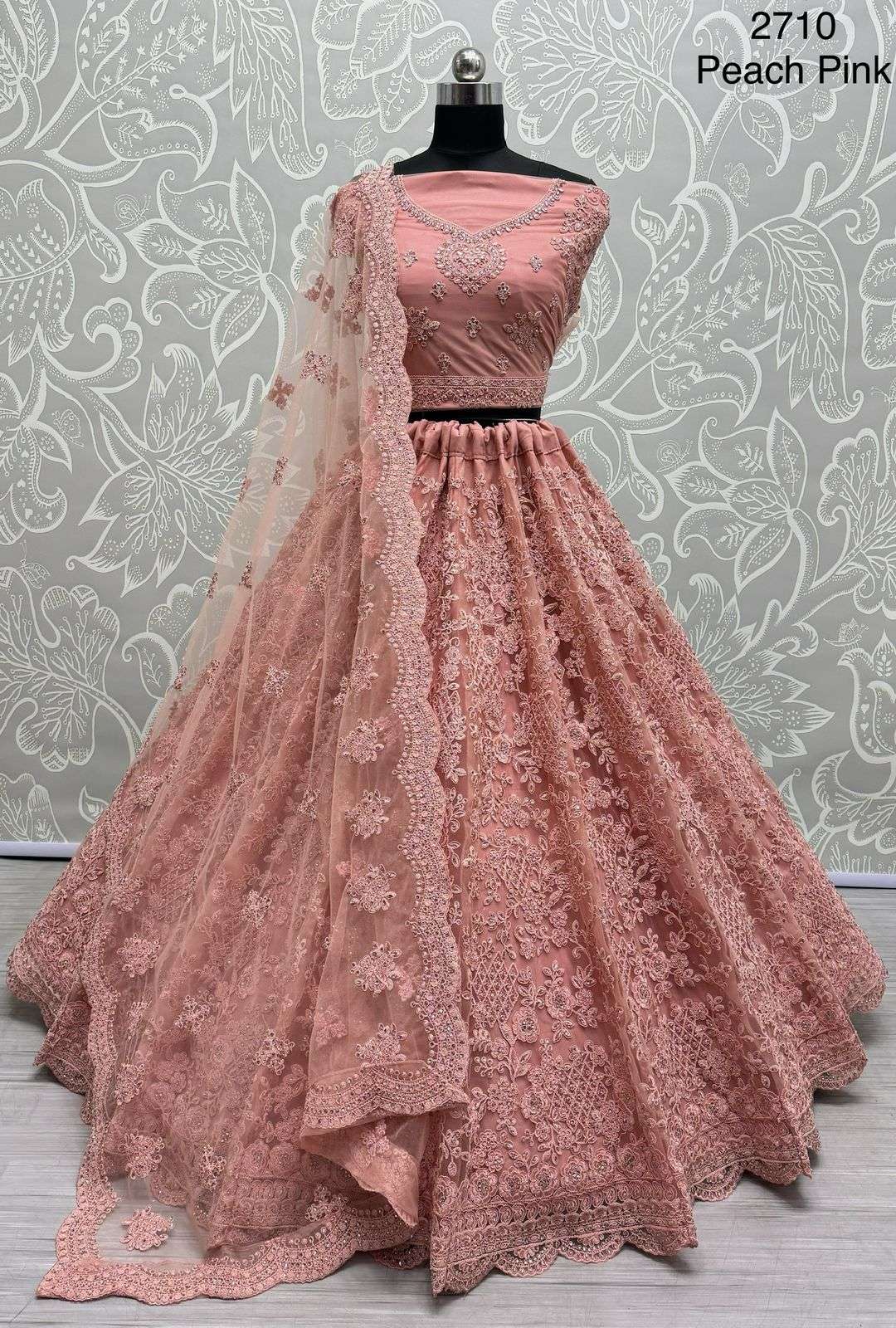 A-2710 PEACH PINK HIT DESIGN BY SUSWANI HEAVY DESIGNER NET BRIDAL LEHENGA